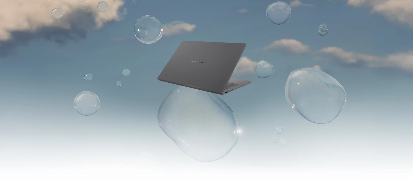 Grey ASUS Zenbook A14 UX3407NA shown from the rear against the official blue bubble backdrop.